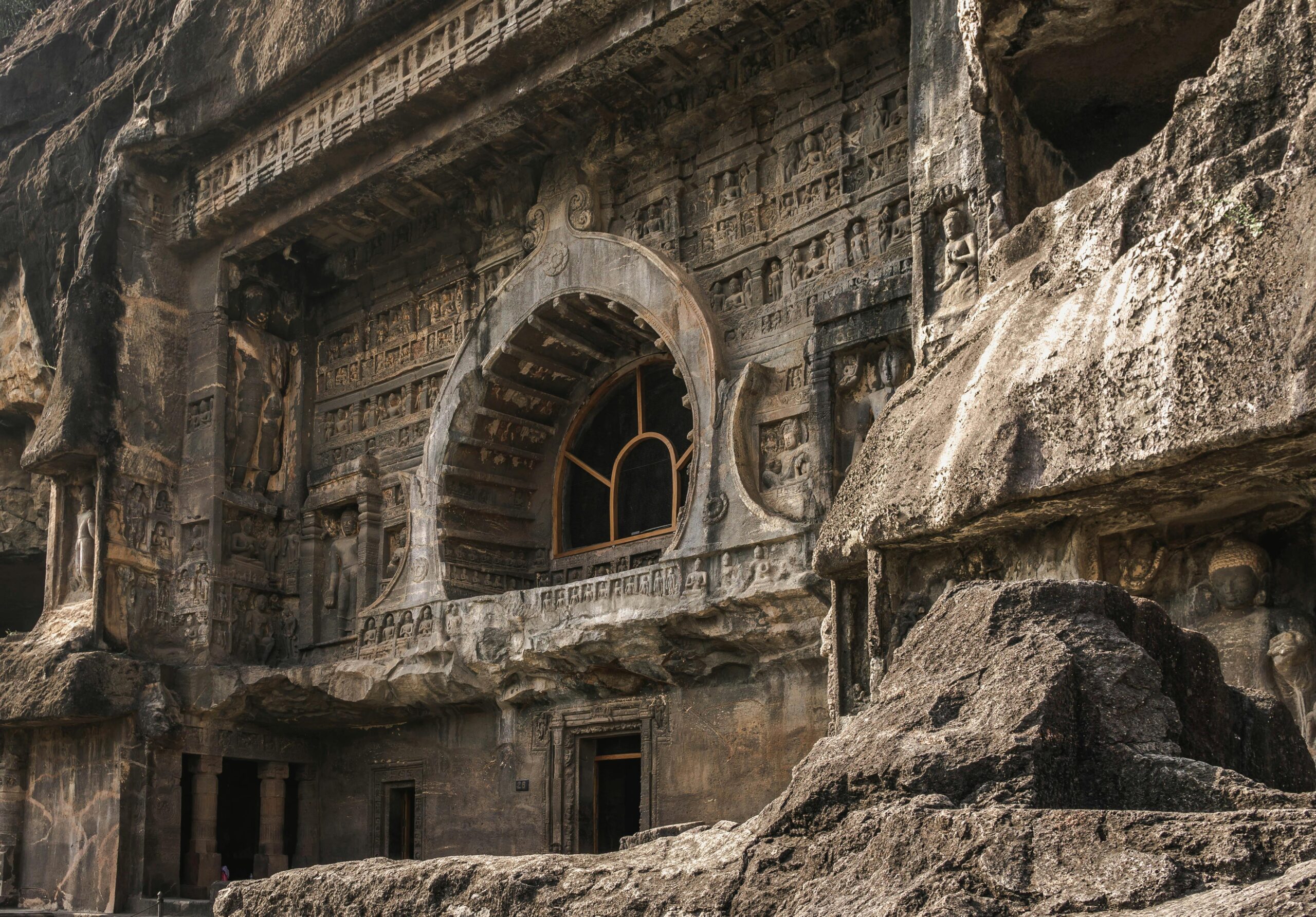 Explore the intricate carvings of the Ajanta Caves, a UNESCO World Heritage site in Maharashtra, India.